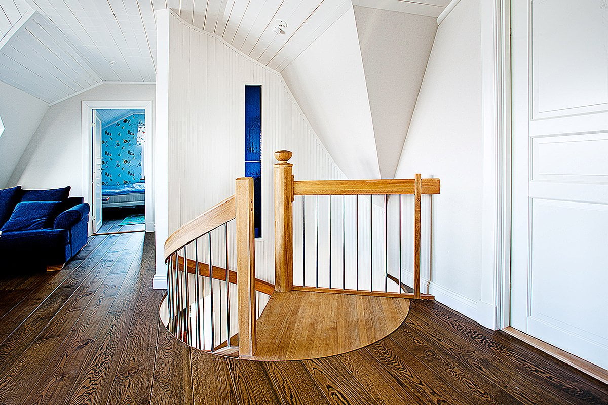 Spiral staircase The Loop with round opening holes between floors.